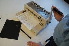 Document binding services at Sunshine Pack & Ship